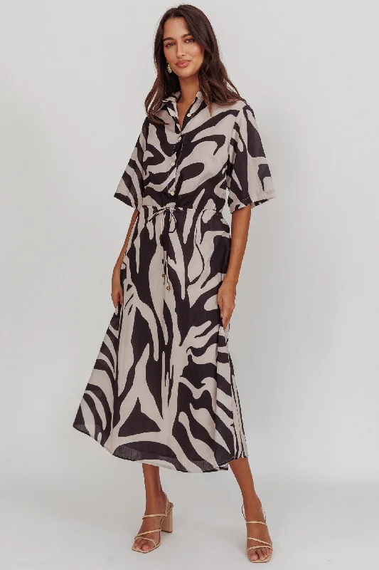 Midi dresses with animal prints for a bold and confident appearance Tiki Boxy Sleeve Print A-line Midi Dress Beige Midi dresses with animal prints for a bold and confident appearance Tiki Boxy Sleeve Print A-line Midi Dress Beige