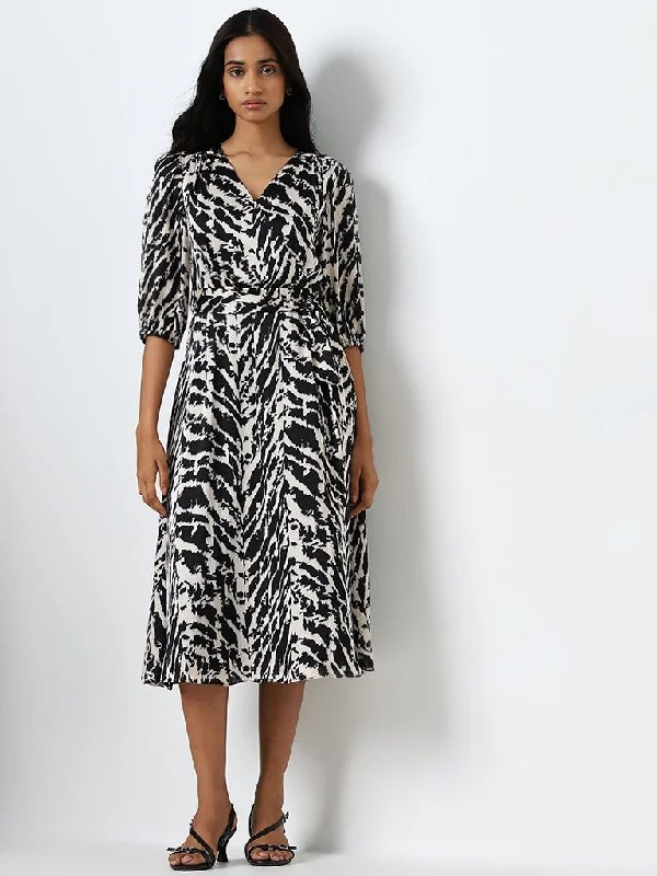 Linen mini dresses for a breathable summer option Wardrobe Black Animal Design A-Line Dress with Belt Linen mini dresses for a breathable summer option Wardrobe Black Animal Design A-Line Dress with Belt