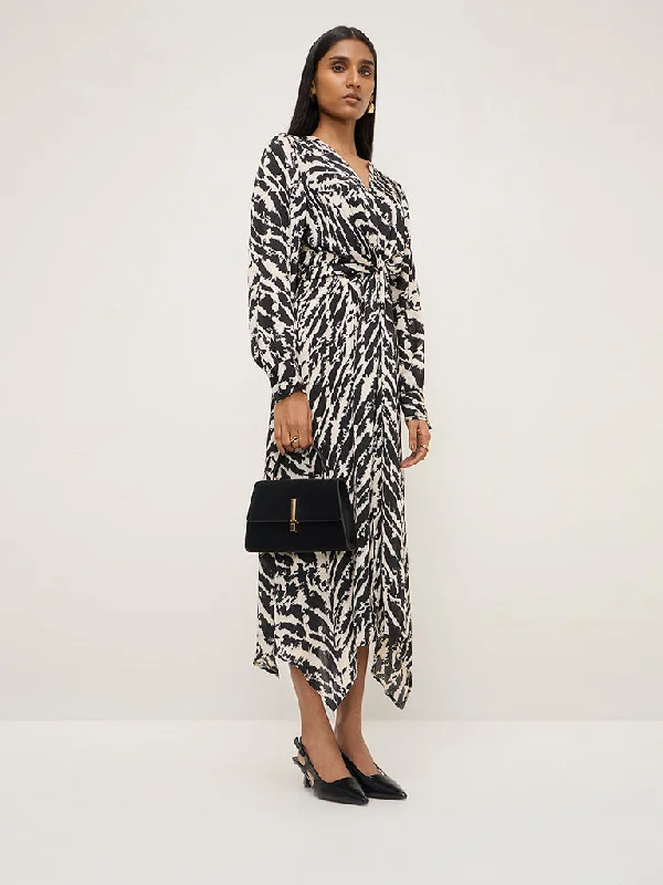 Mini dresses with abstract prints for an artistic look Wardrobe Black Animal Printed A-Line Dress Mini dresses with abstract prints for an artistic look Wardrobe Black Animal Printed A-Line Dress