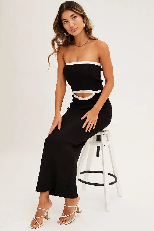 Midi dresses with keyhole backs for a flirty and unexpected detail Black Cut Out Knit Midi Dress Midi dresses with keyhole backs for a flirty and unexpected detail Black Cut Out Knit Midi Dress