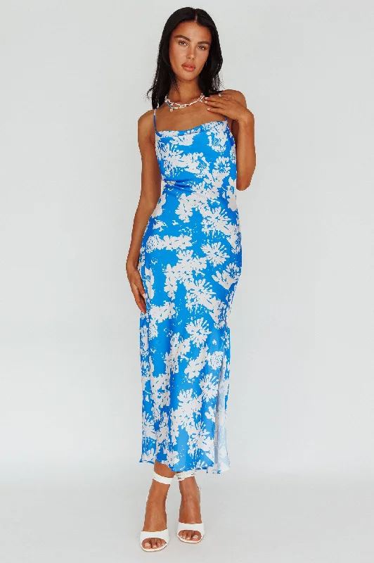 Midi dresses with ruffled sleeves for a more feminine and voluminous look Sherilyn Criss-Cross Back Midi Dress Blue Floral Midi dresses with ruffled sleeves for a more feminine and voluminous look Sherilyn Criss-Cross Back Midi Dress Blue Floral