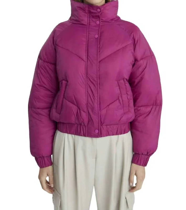 Long women's mac coats in a lightweight fabric for spring showersHarrison Puffer Jacket In Orchid Long women's mac coats in a lightweight fabric for spring showersHarrison Puffer Jacket In Orchid