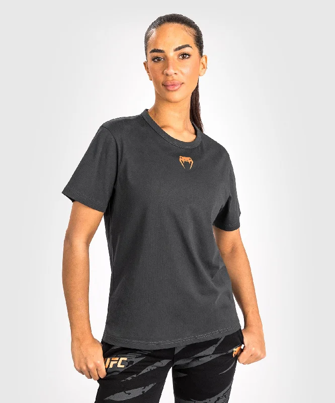 Graphic Print Women T Shirt for a Trendy StatementUFC Adrenaline by Venum Fight Week Women’s Short Sleeve Cotton T-Shirt - Charcoal Grey Graphic Print Women T Shirt for a Trendy StatementUFC Adrenaline by Venum Fight Week Women’s Short Sleeve Cotton T-Shirt - Charcoal Grey