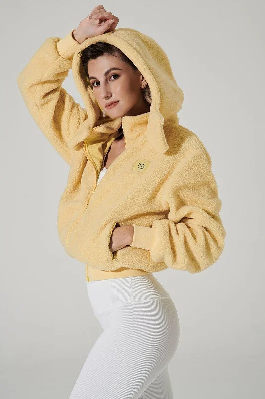Women's hoodie with a glittery print for a glamorous and sparkly appearanceTeddy Sherpa Jacket - Yellowtide Women's hoodie with a glittery print for a glamorous and sparkly appearanceTeddy Sherpa Jacket - Yellowtide