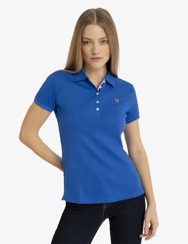 Floral print short - sleeve polo shirt for a feminine lookSOLID INTERLOCK POLO SHIRT Floral print short - sleeve polo shirt for a feminine lookSOLID INTERLOCK POLO SHIRT