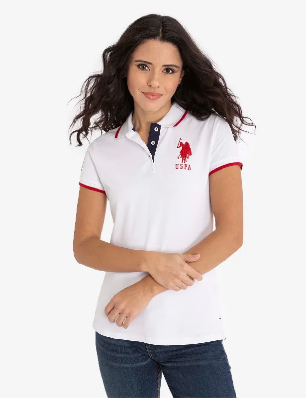 Machine - washable polo shirt in durable jersey fabricSOLID TRIPLE CROWN POLO SHIRT